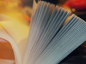 Top edge fanning out as a book is flipped though by a copyeditor