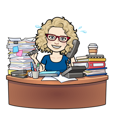 Sue Littleford, copyeditor, sitting behind a busy desk for value versus price article